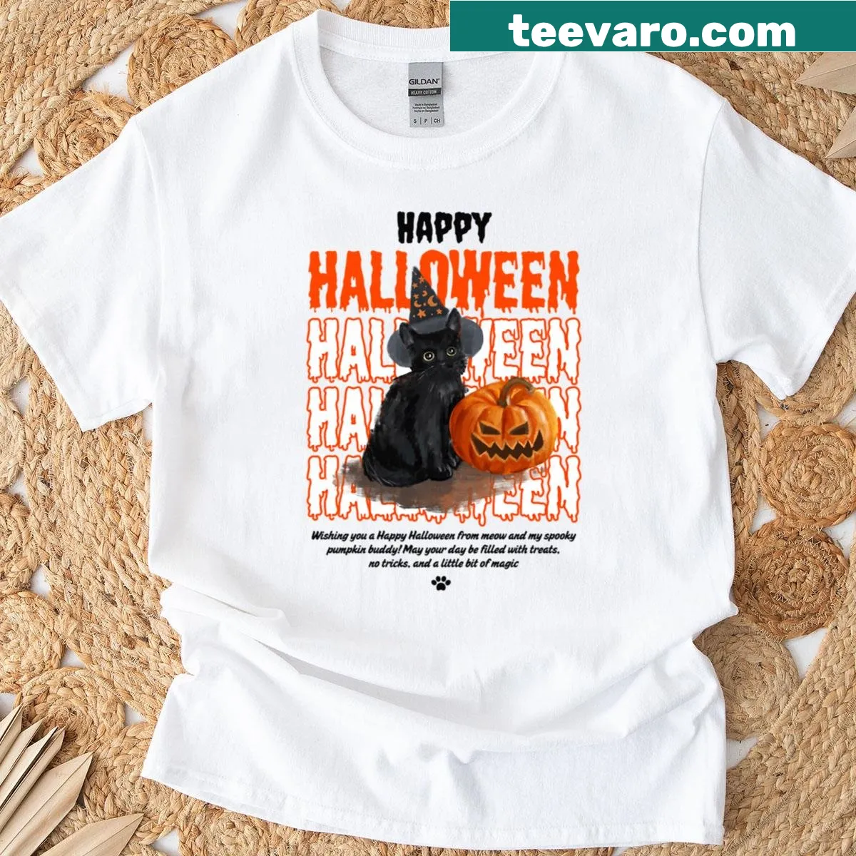 Glowing witch cat and pumpkin graphic on Halloween T-shirt — on a men's t-shirt