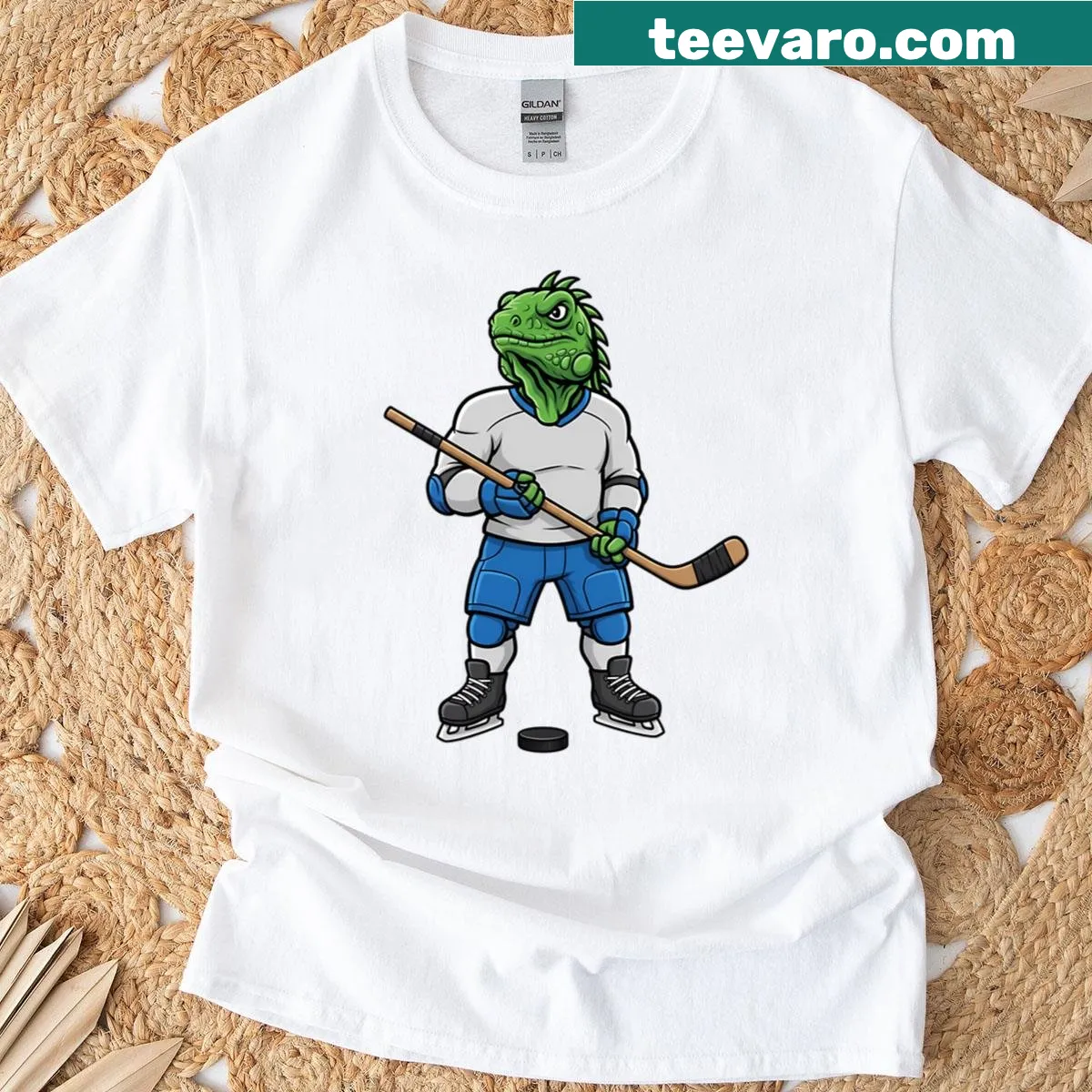 Oversized t-shirt featuring a playful hockey iguana mascot illustration — on a men's t-shirt