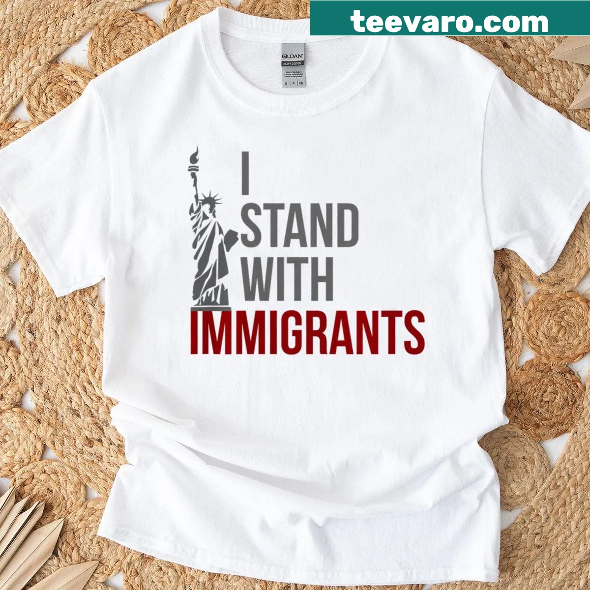 Bold text T-shirt with 'I Stand With Immigrants' promoting DACA rights — on a men's t-shirt