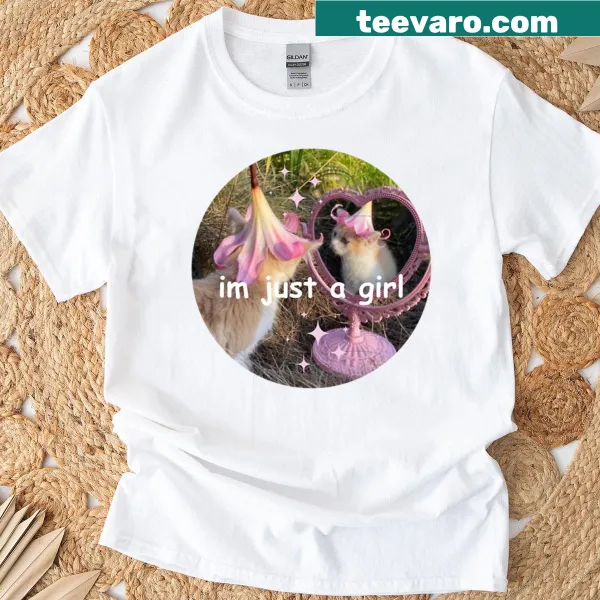 Cute T-shirt featuring a cartoon cat and the phrase I'm Just A Girl