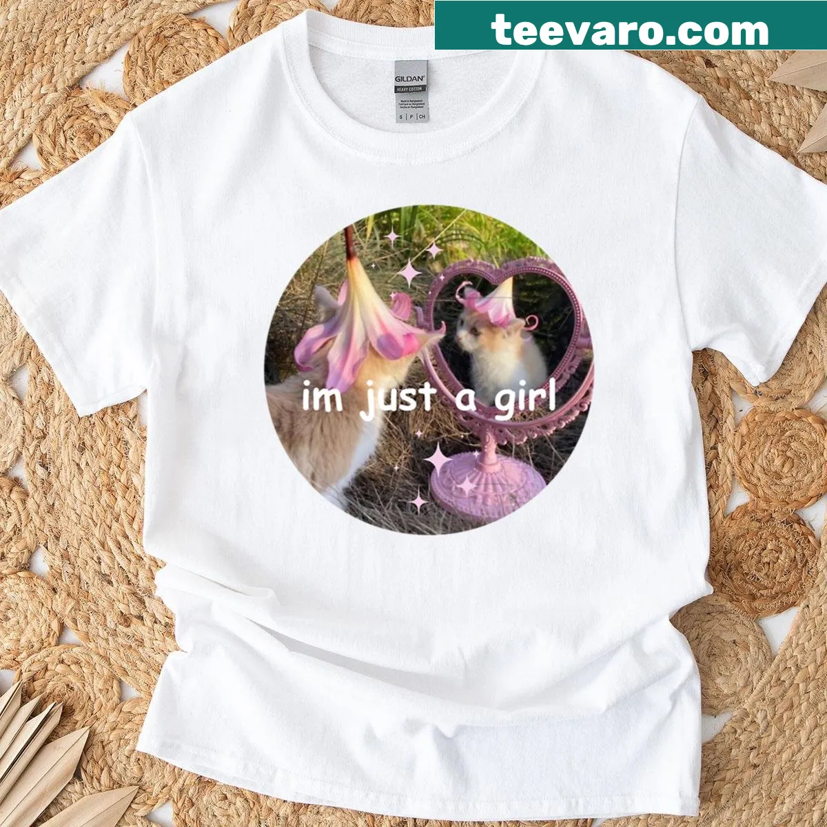 Cute T-shirt featuring a cartoon cat and the phrase I'm Just A Girl — on a men's t-shirt