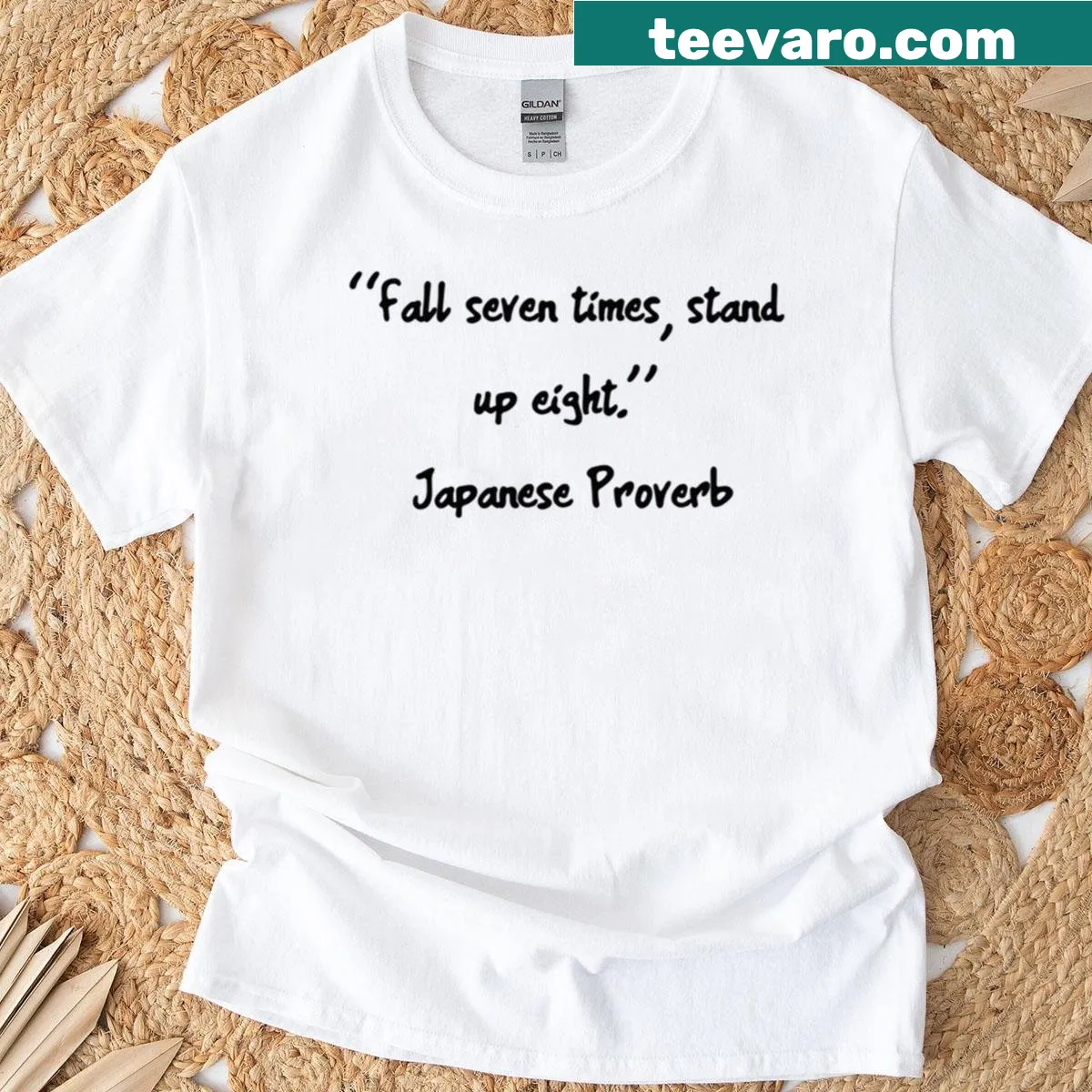 Elegant typography of a Japanese proverb on a T-shirt. — on a men's t-shirt