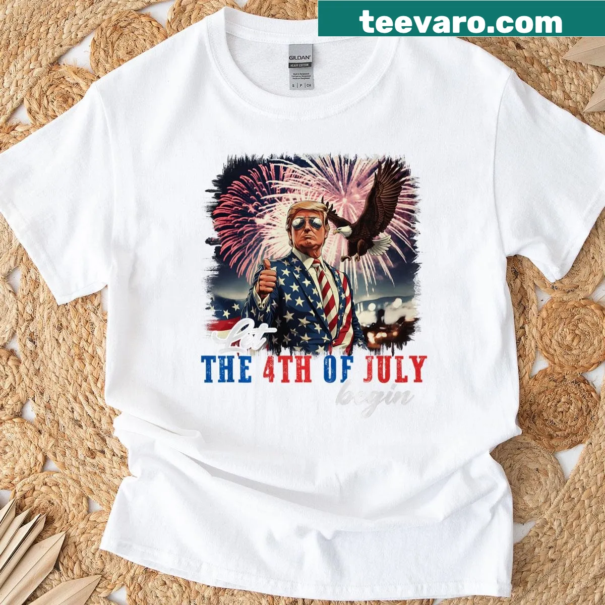 Patriotic T-shirt with USA flag and 'Let The 4th Of July Begin' text — on a men's t-shirt