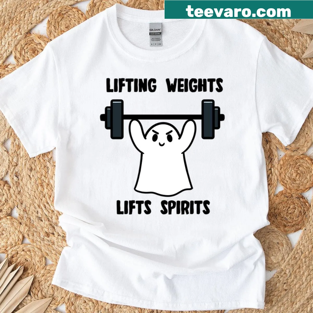 Cute ghost lifting weights illustrated on a t-shirt. — on a men's t-shirt