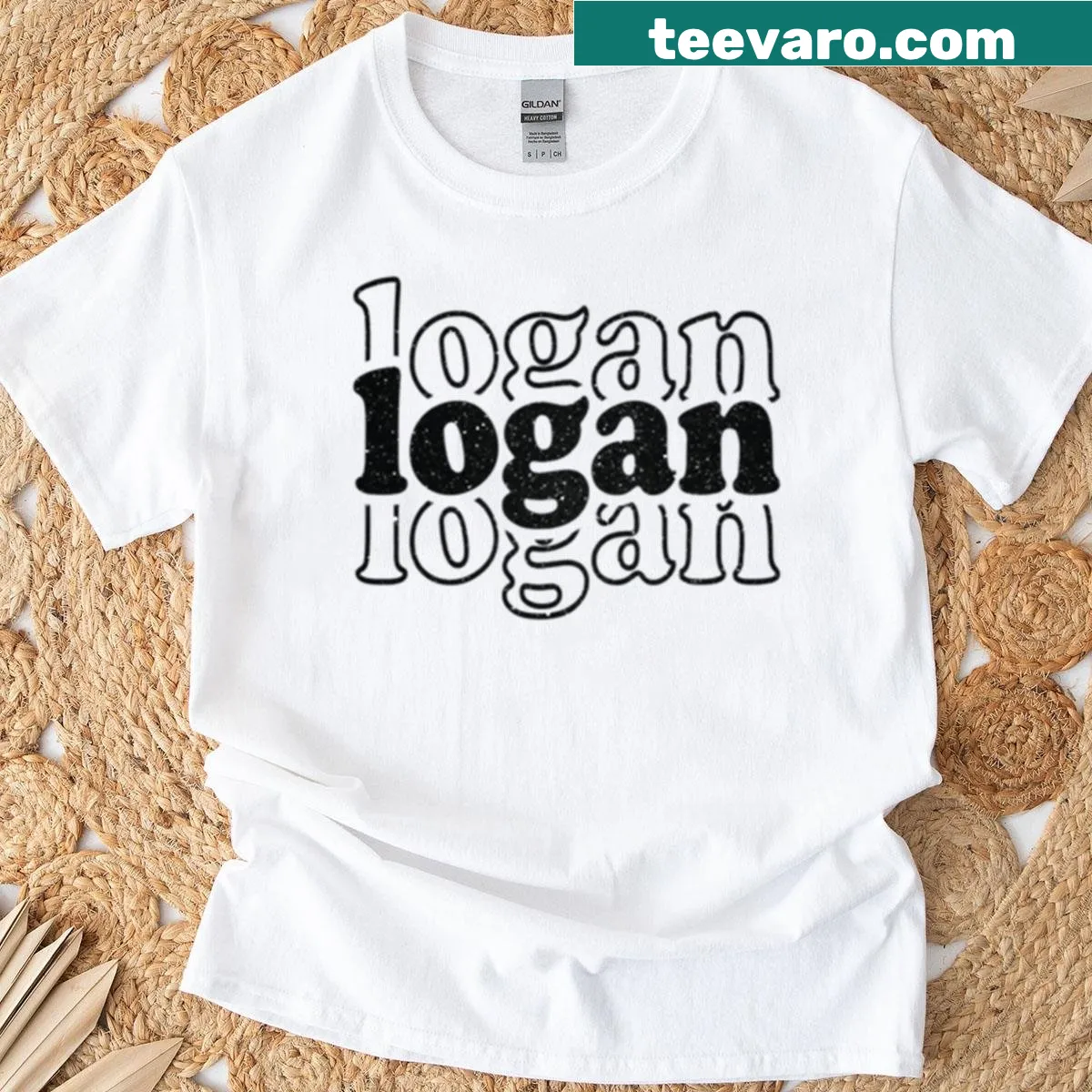 Personalized T-shirt with the name Logan printed prominently — on a men's t-shirt