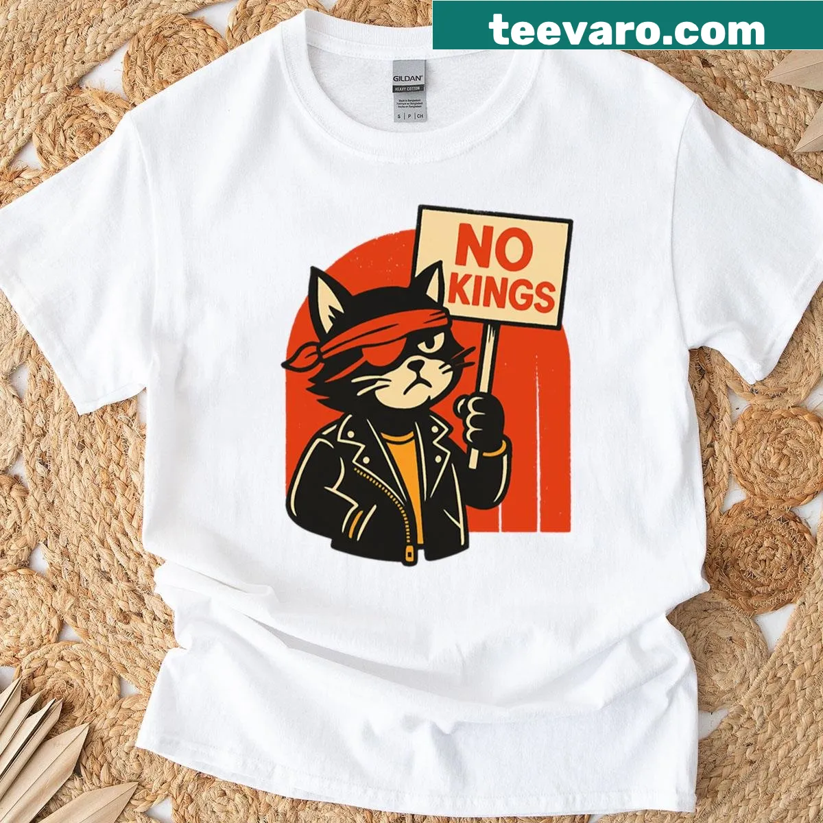 Illustration of a rebellious cat wearing a crown on a T-shirt — on a men's t-shirt