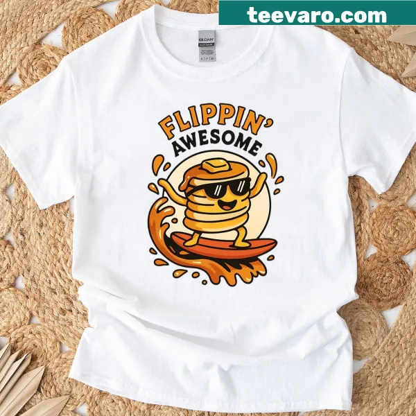 Cartoon T-shirt of pancakes surfing on syrup waves
