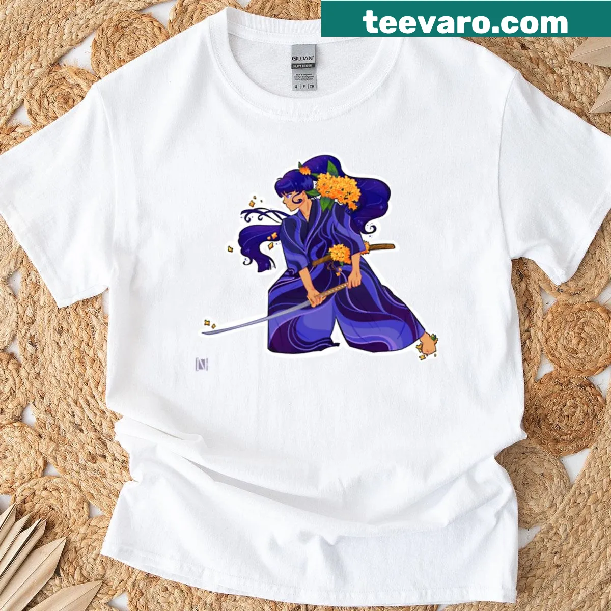 Graphic t-shirt featuring a stylized Osmanthus flower design — on a men's t-shirt