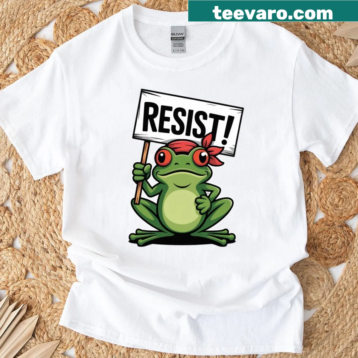 Cartoon frog holding a protest sign graphic on a t-shirt — on a men's t-shirt