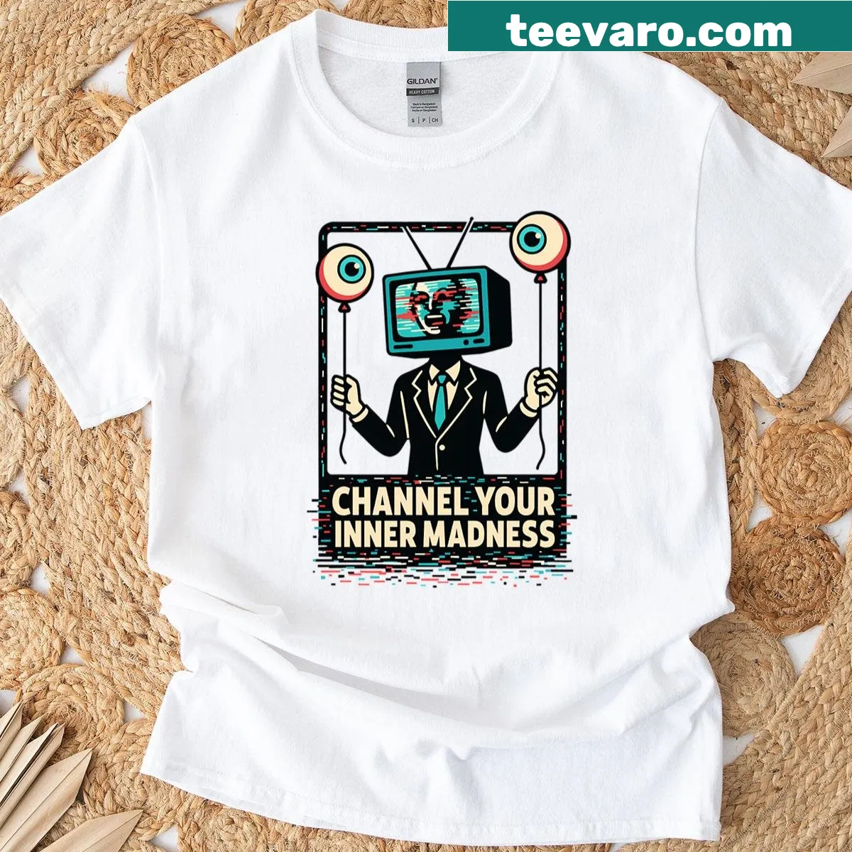 Cartoon t-shirt featuring retro TV head, eyeball, and balloons — on a men's t-shirt