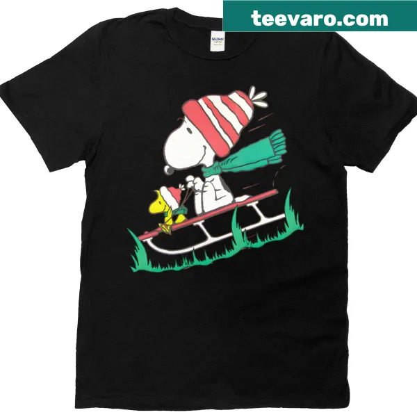 Snoopy and Woodstock sledding graphic T-shirt