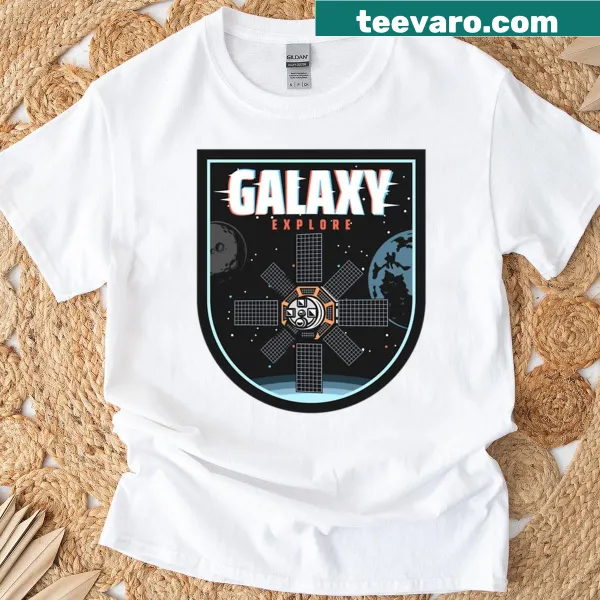 T-shirt featuring a space satellite insignia exploring the galaxy