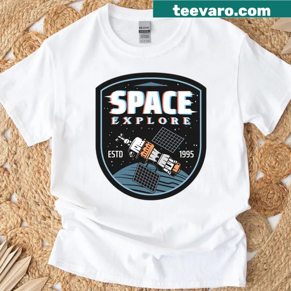 Badge-style spaceship graphic on exploration tee