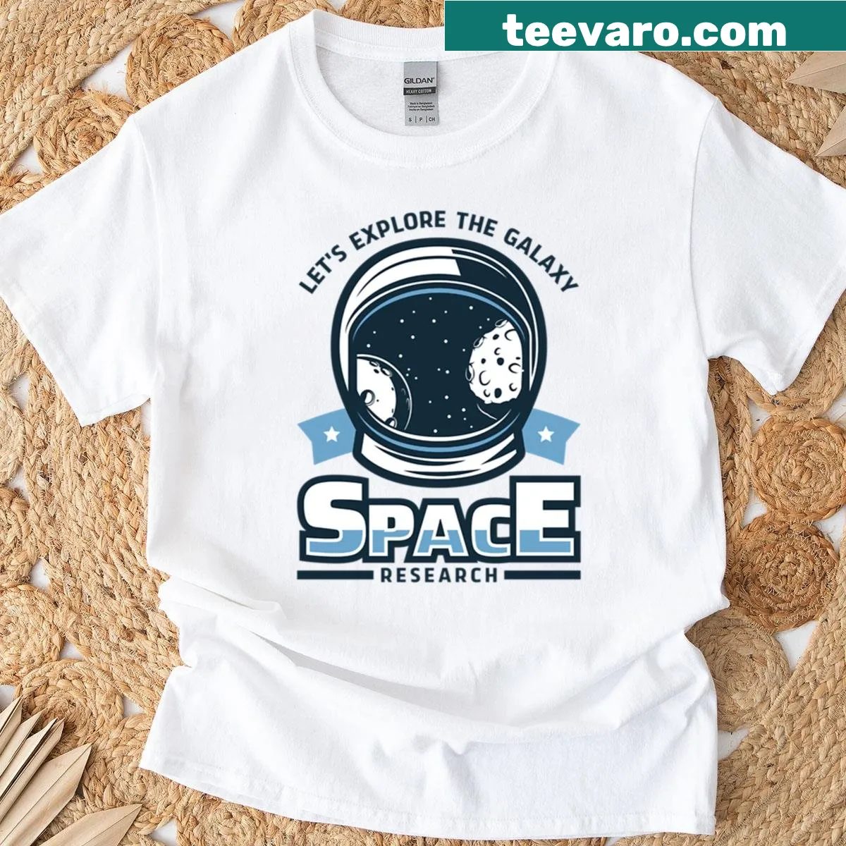 Illustration of an astronaut's spacesuit helmet exploring the galaxy — on a men's t-shirt