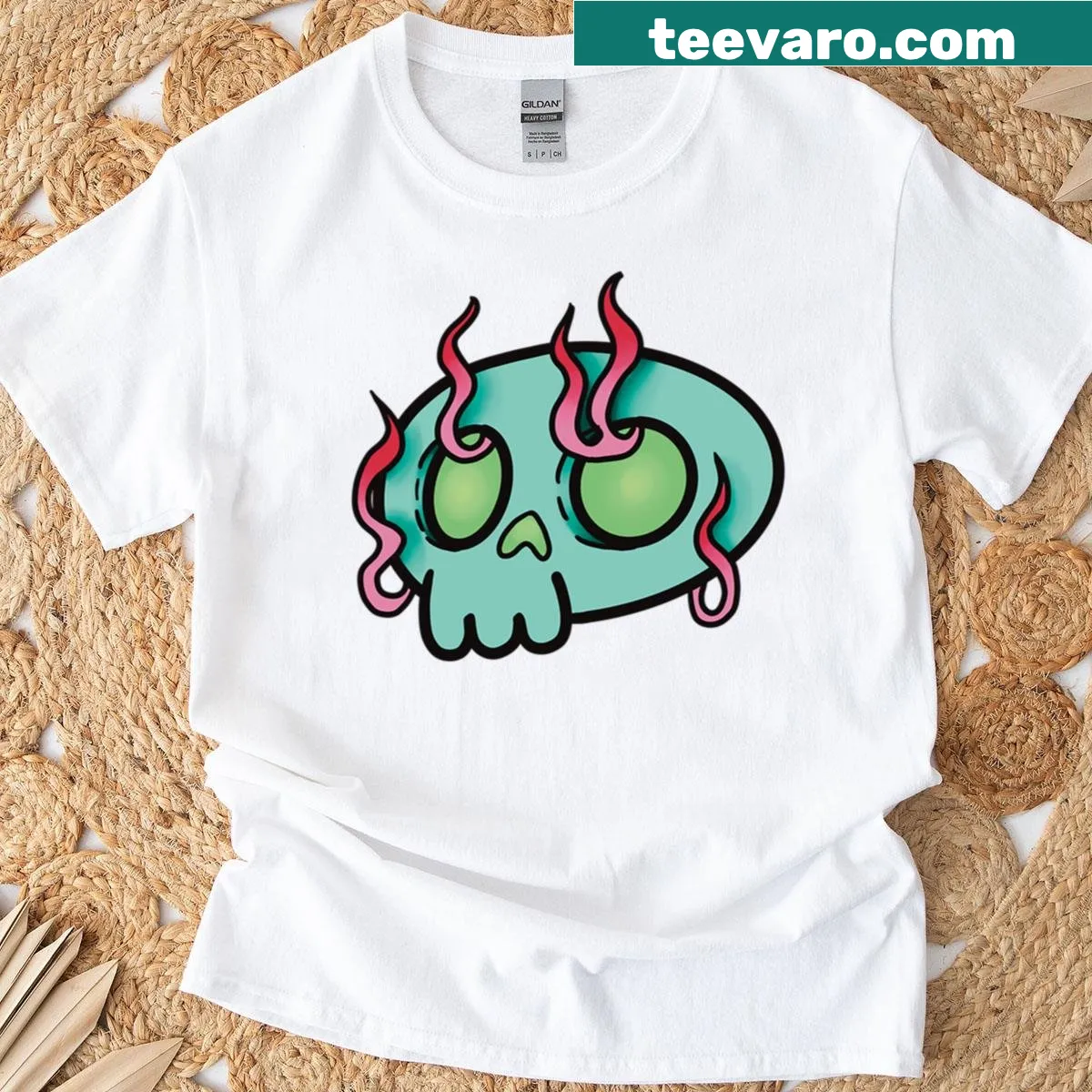 Cartoon flaming skull design on oversized T-shirt — on a men's t-shirt