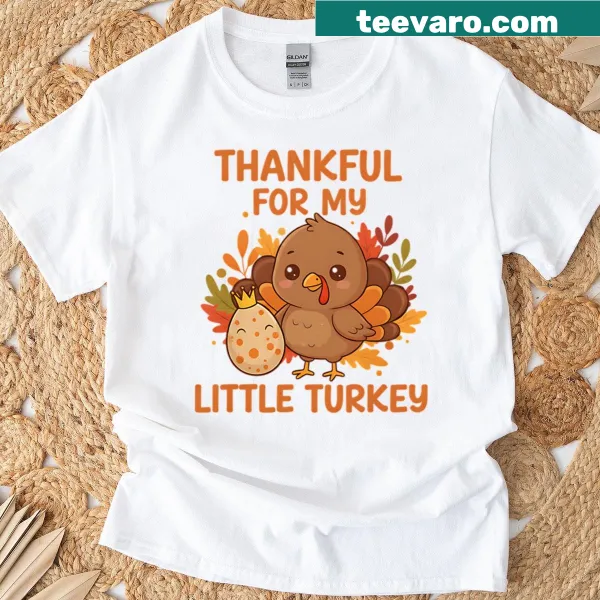 Cute Thanksgiving t-shirt with a turkey graphic and text about being thankful