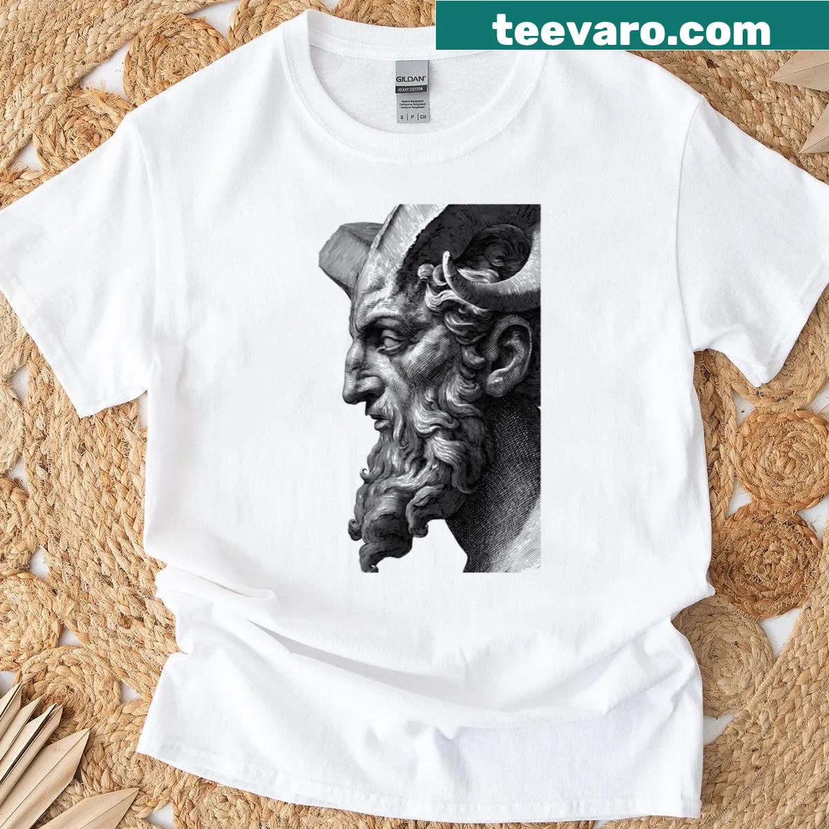 Majestic horned creature graphic on fantasy-themed t-shirt — on a men's t-shirt