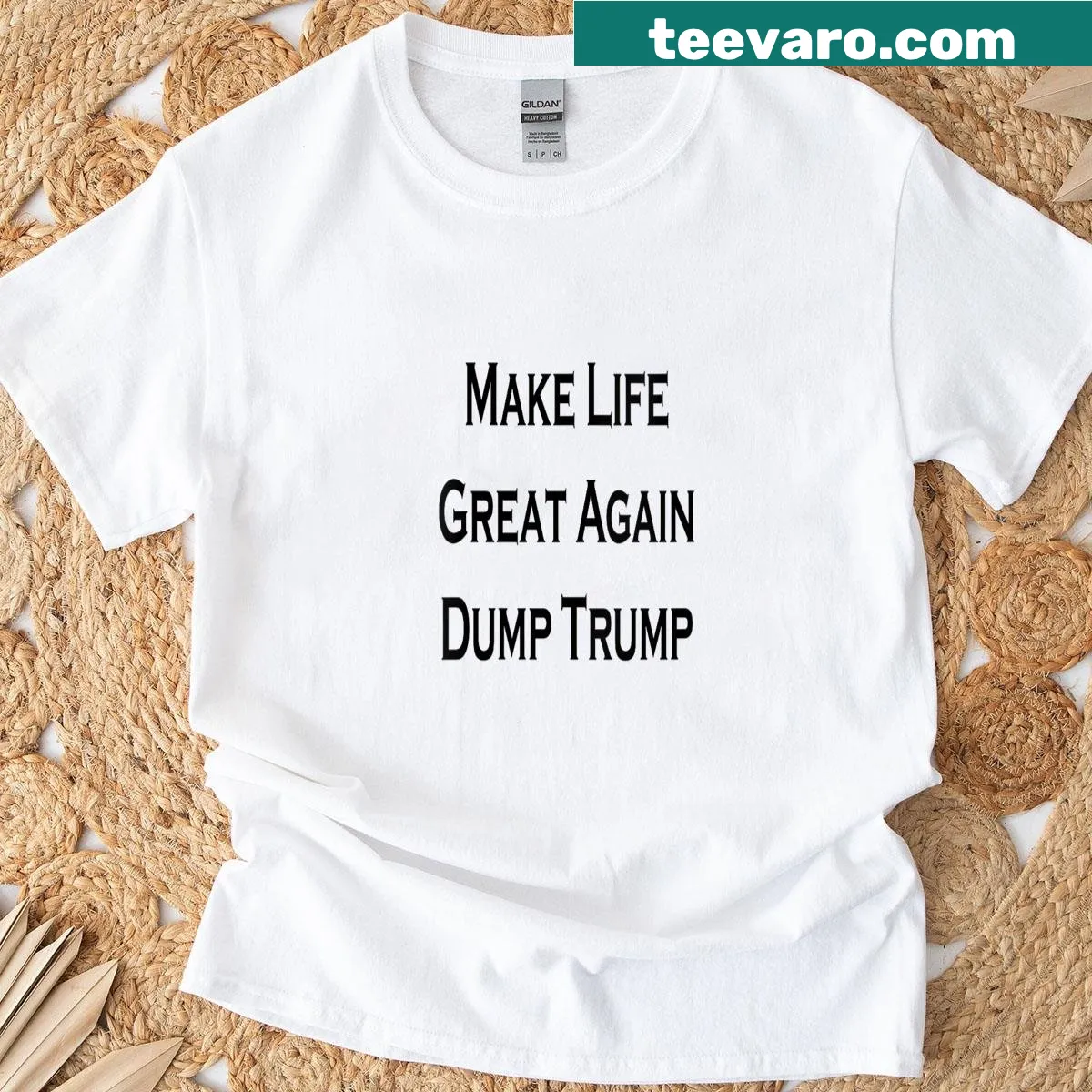 Text reads 'Make Life Great Again, Dump Trump' on a T-shirt. — on a men's t-shirt