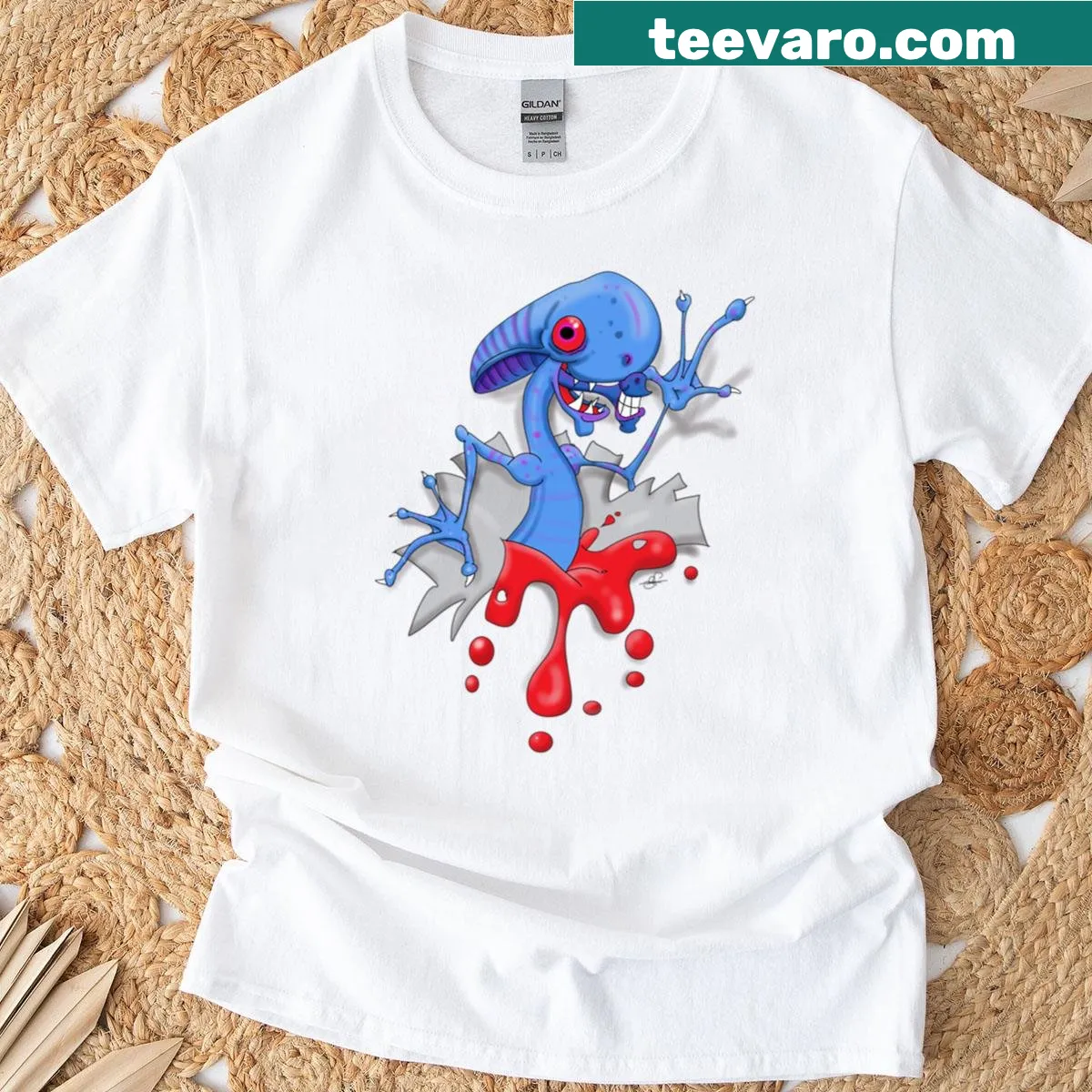 Oversized T-shirt with whimsical alien baby character design — on a men's t-shirt