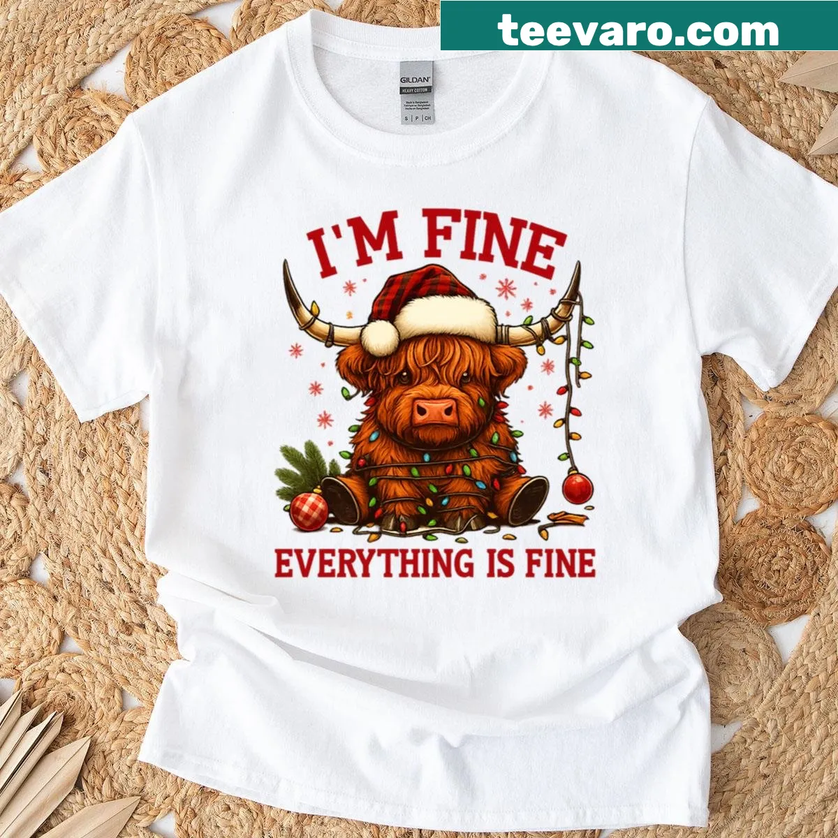 Highland cow with Christmas lights illustration T-shirt — on a men's t-shirt