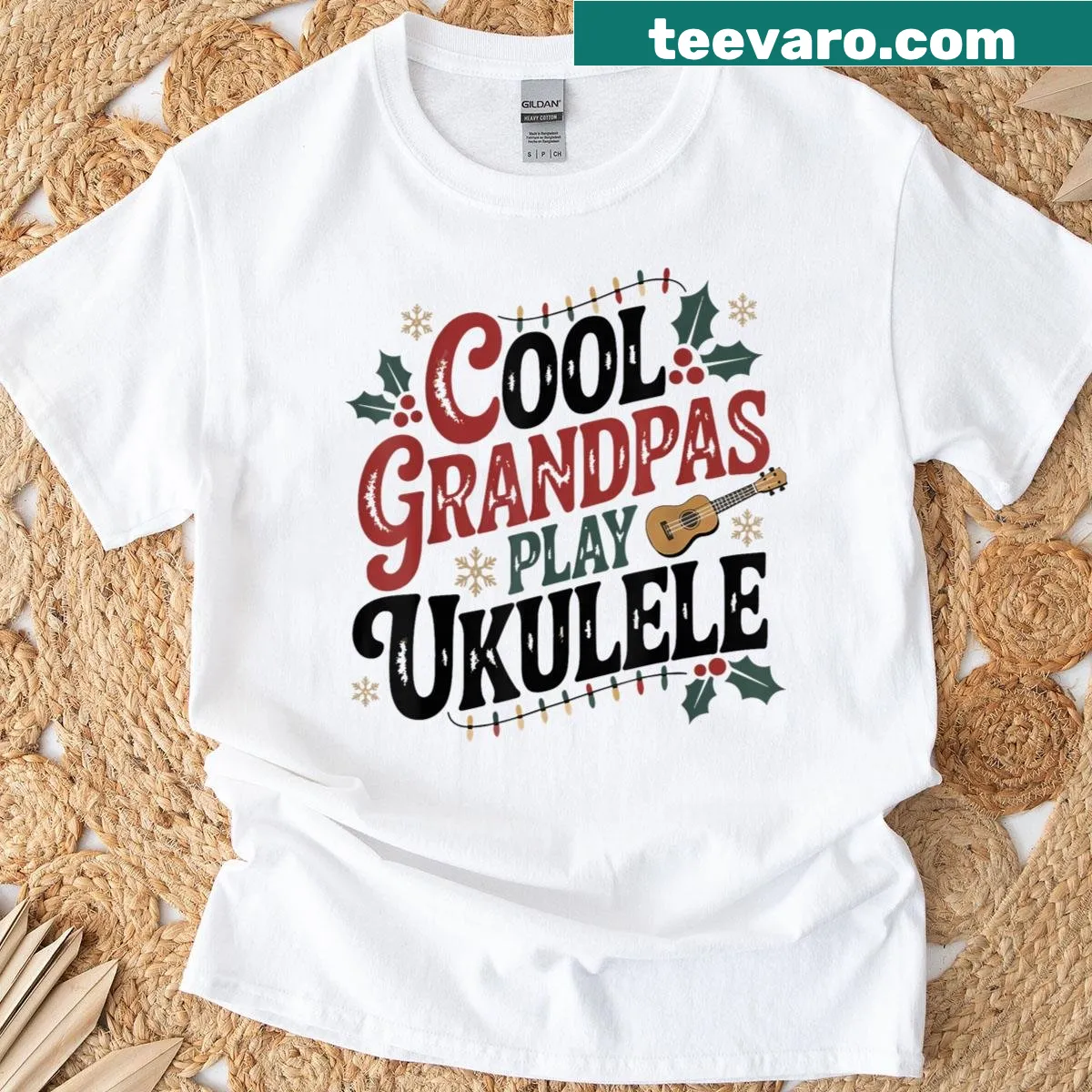 Funny Christmas t-shirt featuring grandpa playing the ukulele — on a men's t-shirt