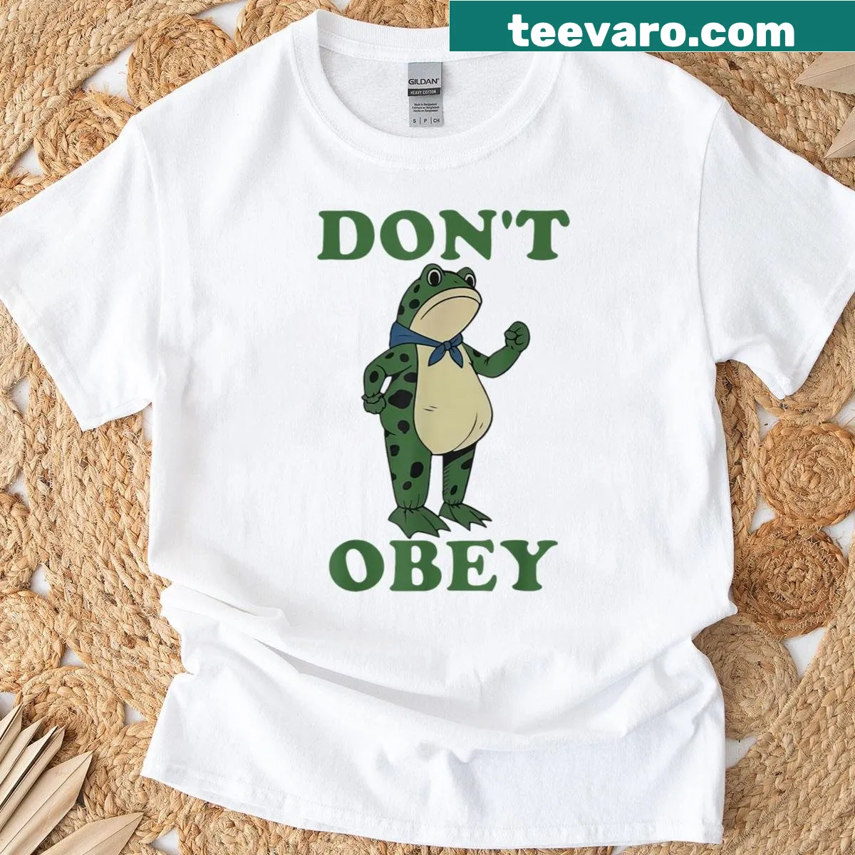 Frog graphic t-shirt with Don't Obey message — on a men's t-shirt