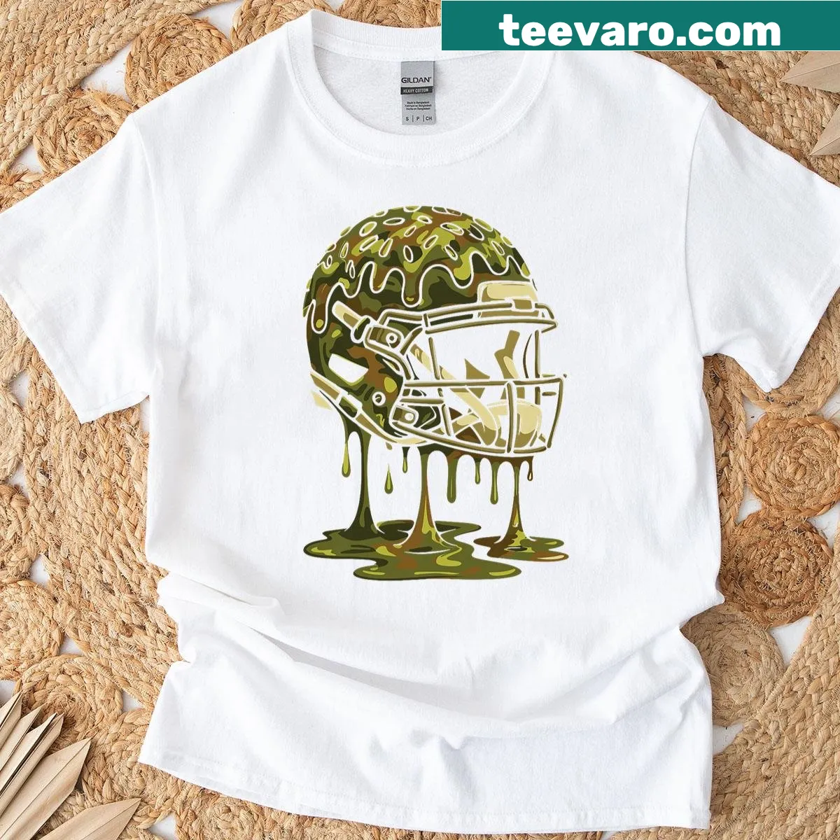 Camo football helmet graphic T-shirt — on a men's t-shirt