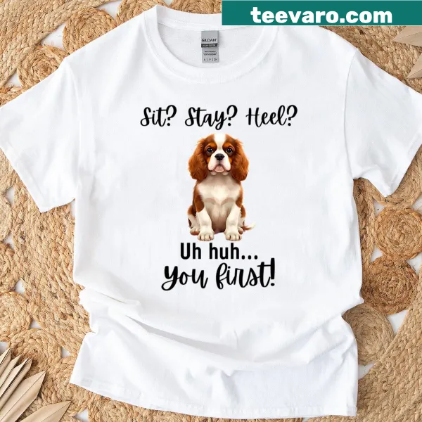 Cartoonish T-shirt with a Cavalier King Charles Spaniel and humorous dog training phrases