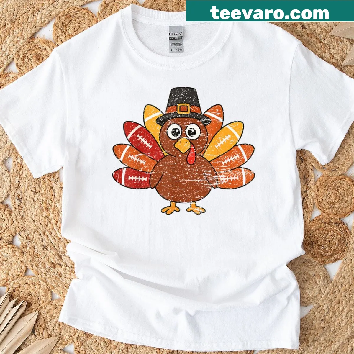 Funny Thanksgiving shirt with a baby turkey football player graphic. — on a men's t-shirt