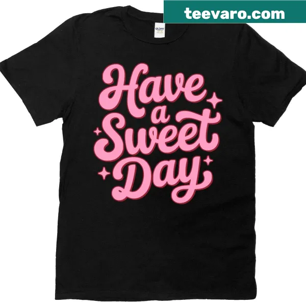 Inspirational pink t-shirt with 'Have A Sweet Day' text in playful font