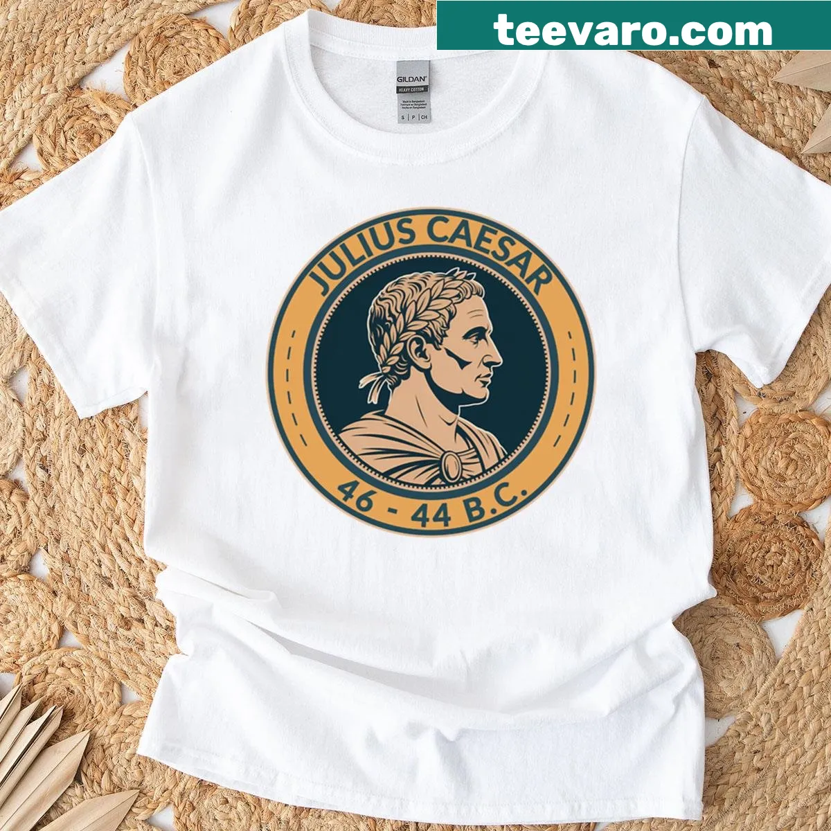 T-shirt featuring a badge illustration of Julius Caesar from the Roman Empire — on a men's t-shirt