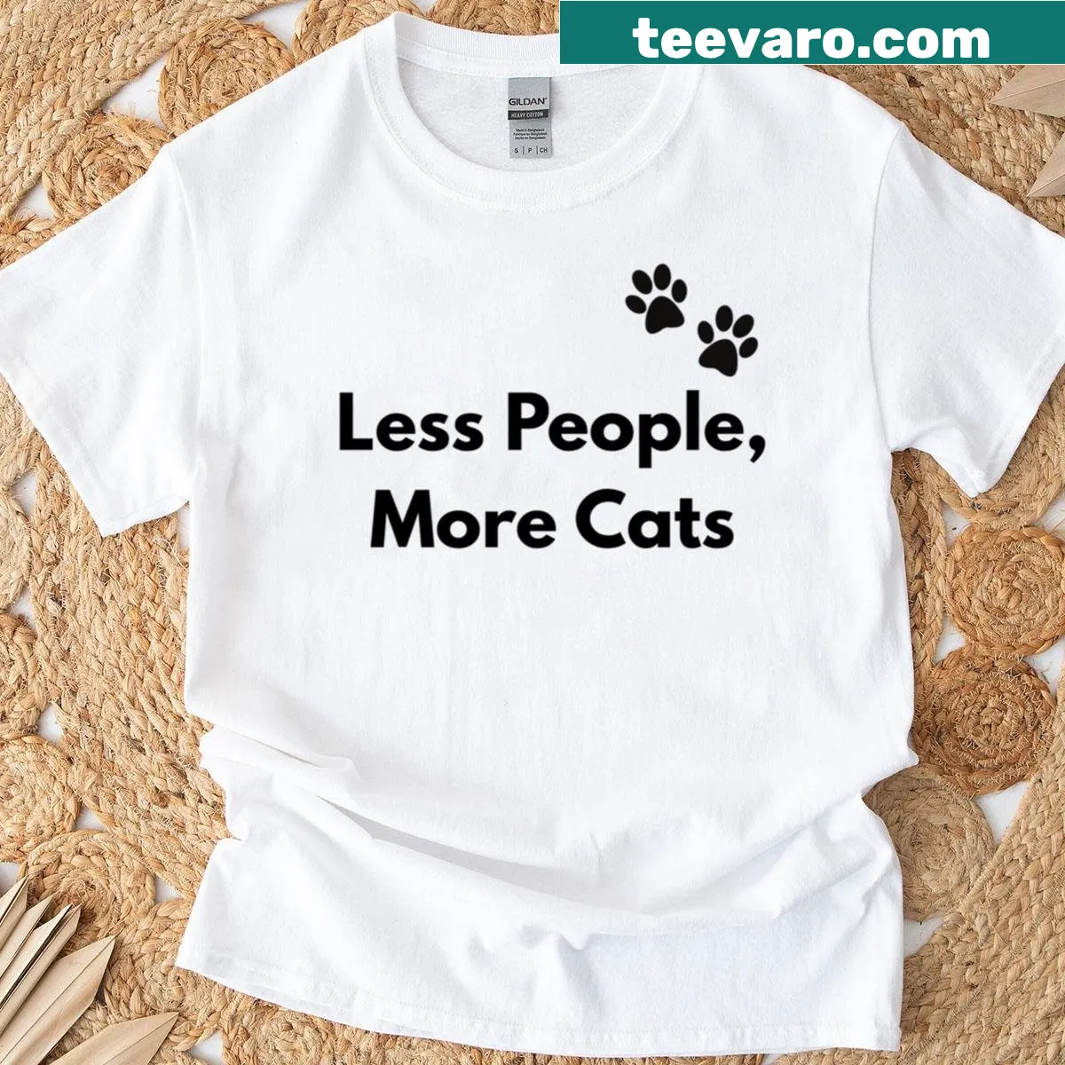 Bold typography with the quote: Less People More Cats — on a men's t-shirt