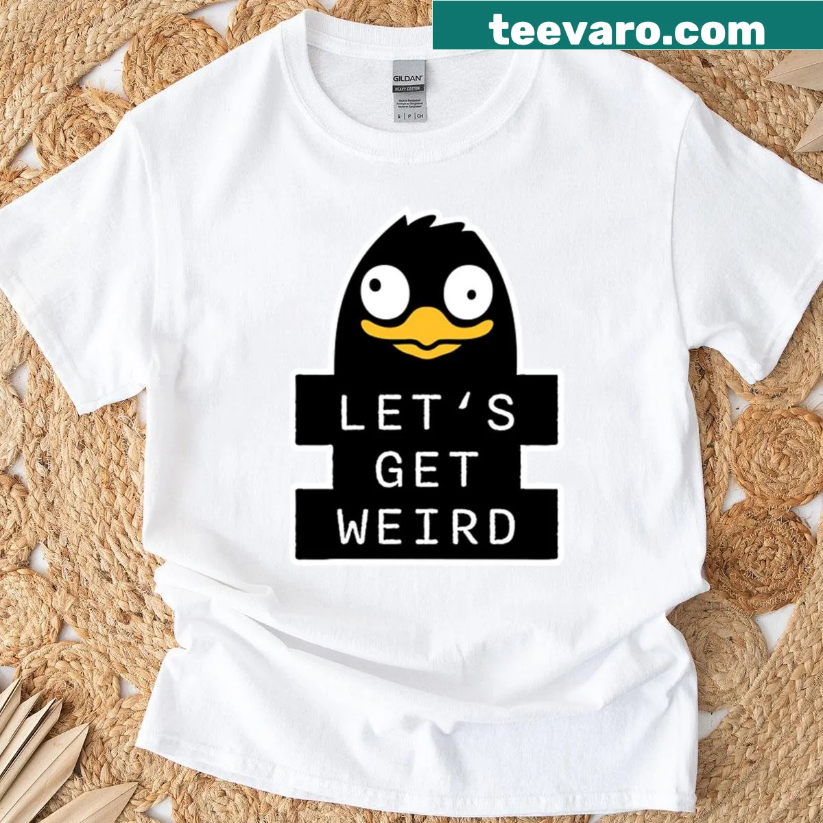 Quirky penguin graphic with text on Let's Get Weird T-shirt — on a men's t-shirt