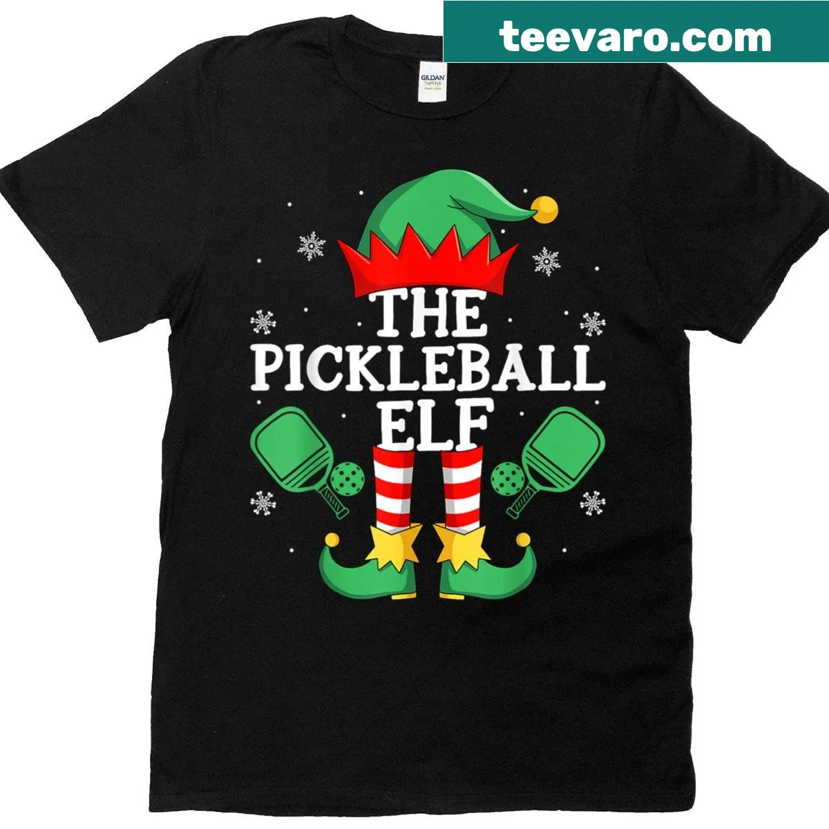 Cartoon elf playing pickleball on a Christmas-themed T-shirt — on a men's t-shirt