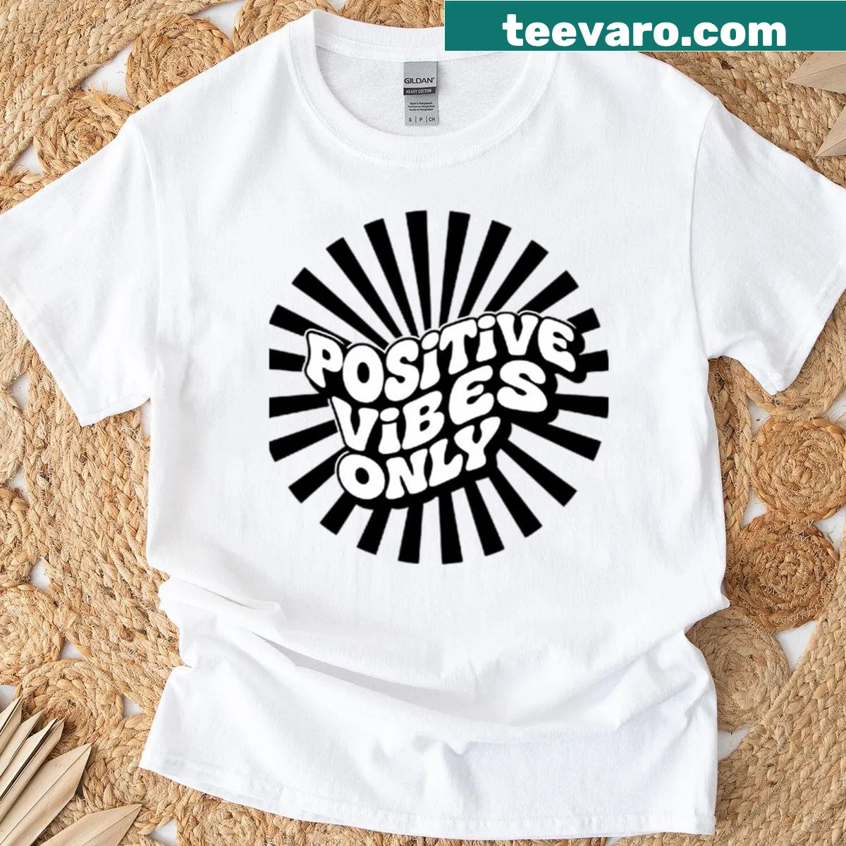 Retro typography t-shirt with 'Positive Vibes Only' and sunburst design — on a men's t-shirt