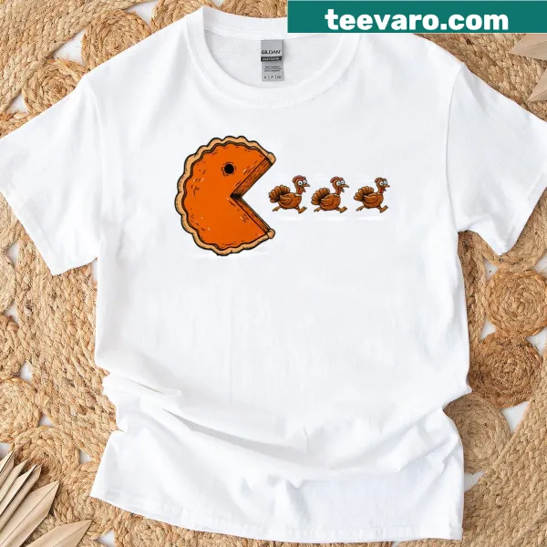 Funny turkey chasing a pumpkin pie design on a Thanksgiving t-shirt