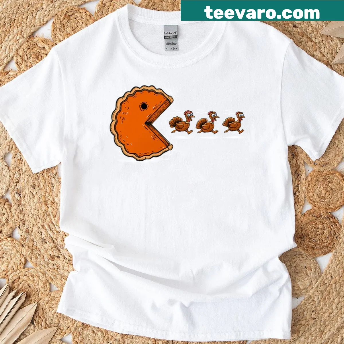Funny turkey chasing a pumpkin pie design on a Thanksgiving t-shirt — on a men's t-shirt