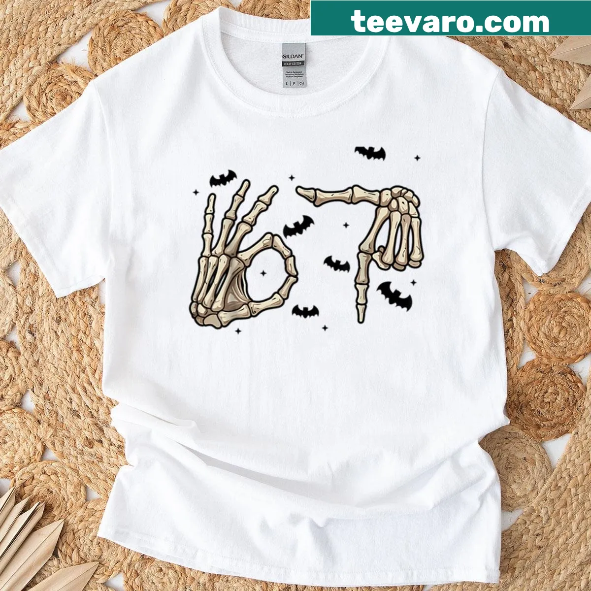 Oversized Halloween shirt with skeleton hand and 67 meme — on a men's t-shirt