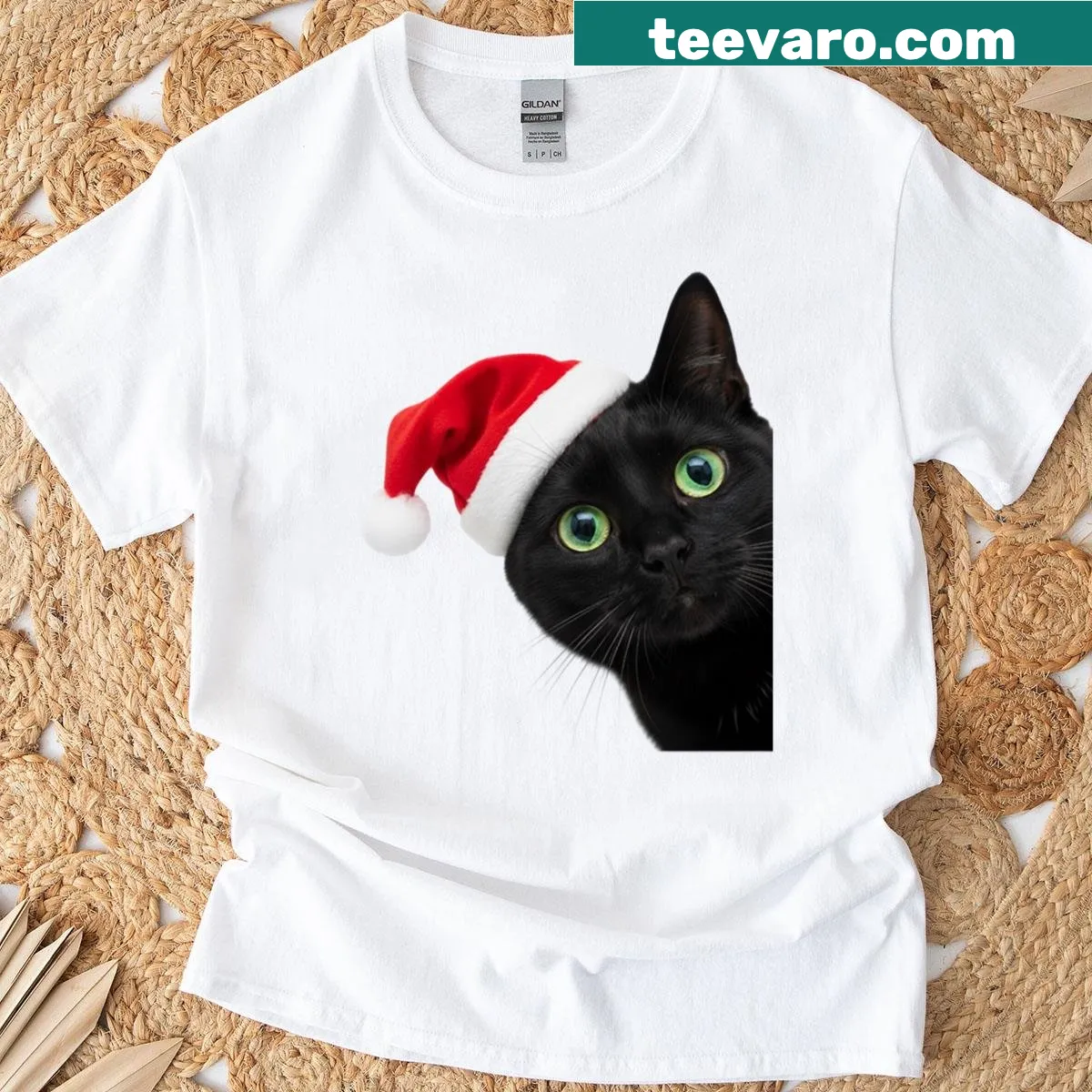 Adorable T-shirt with a sneaky black cat wearing a Santa hat — on a men's t-shirt
