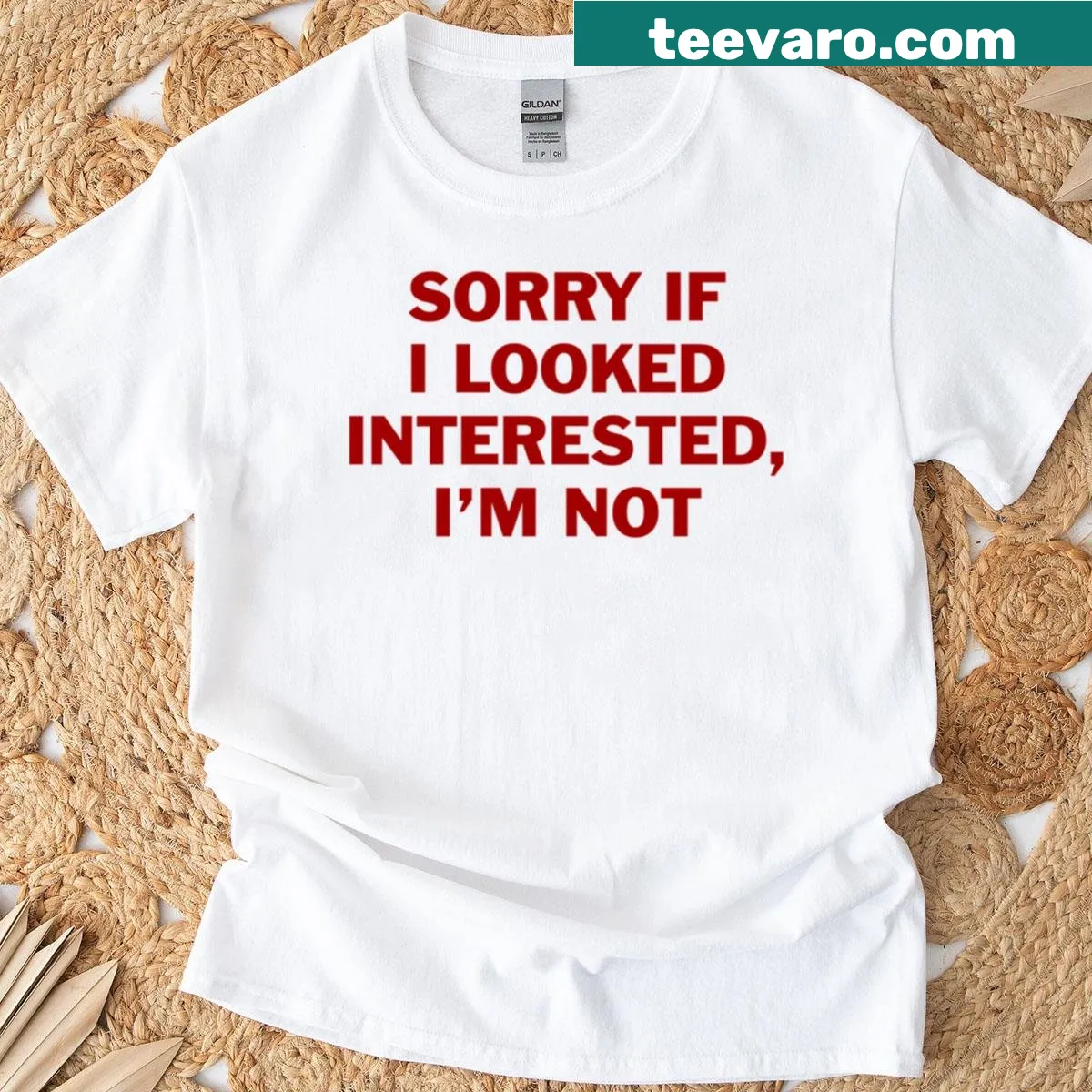 Edgy t-shirt with blunt text stating, 'Sorry If I Looked Interested I'm Not.' — on a men's t-shirt