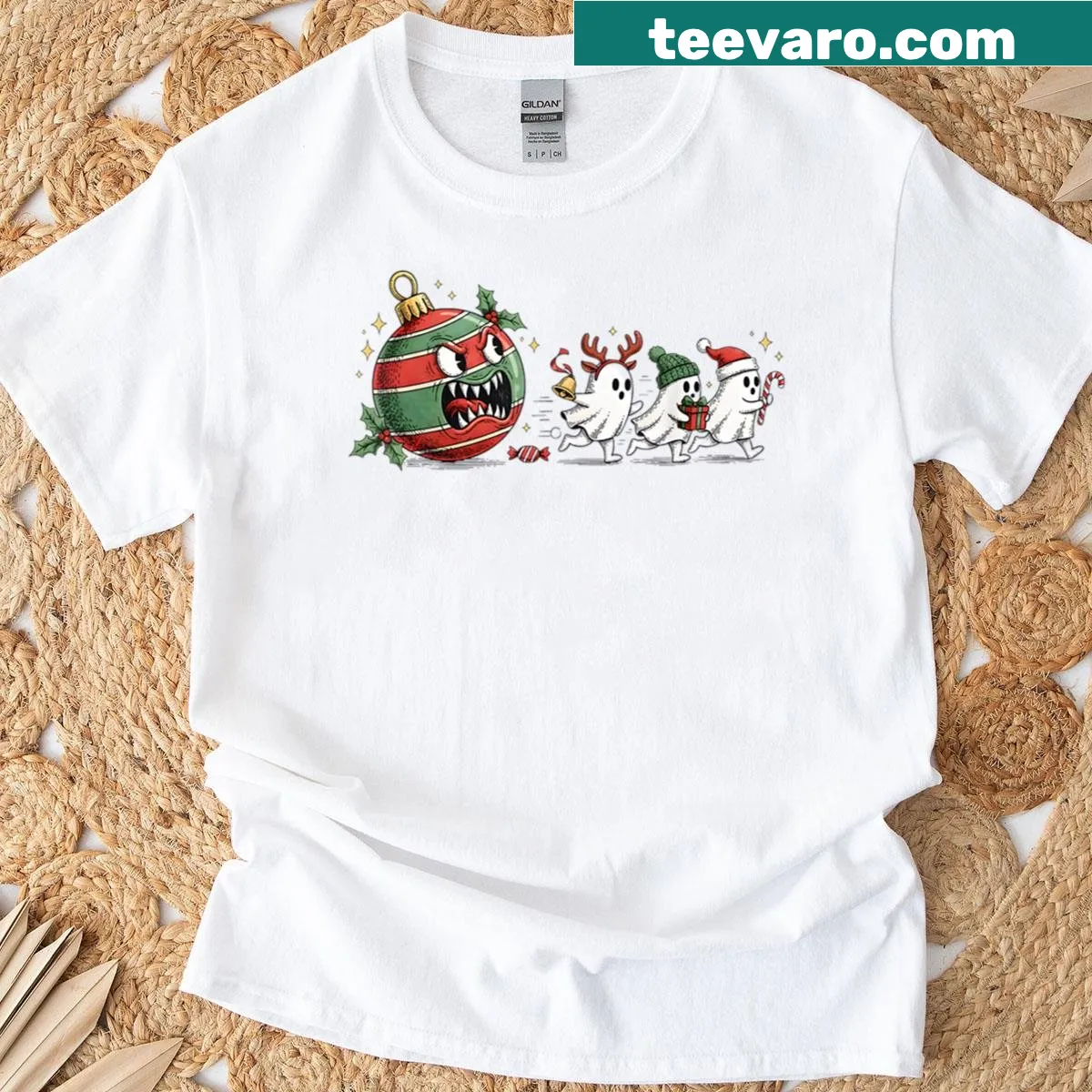 Cartoon ghost chasing a holiday ornament in funny crossover design — on a men's t-shirt