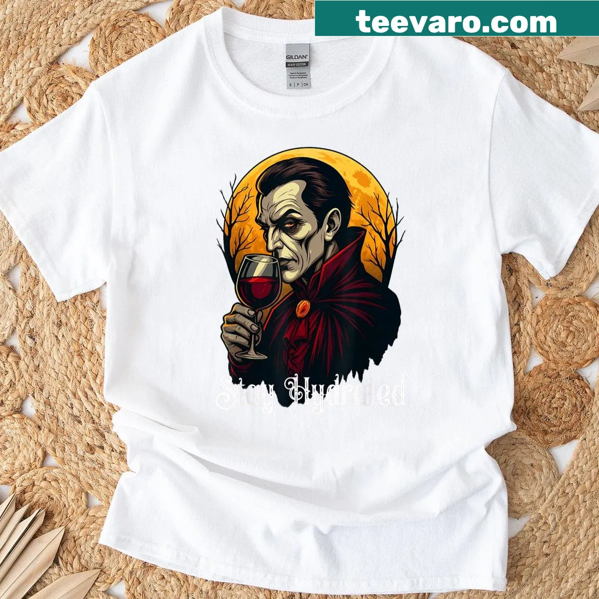Funny Dracula vampire holding a glass of blood t-shirt design — on a men's t-shirt