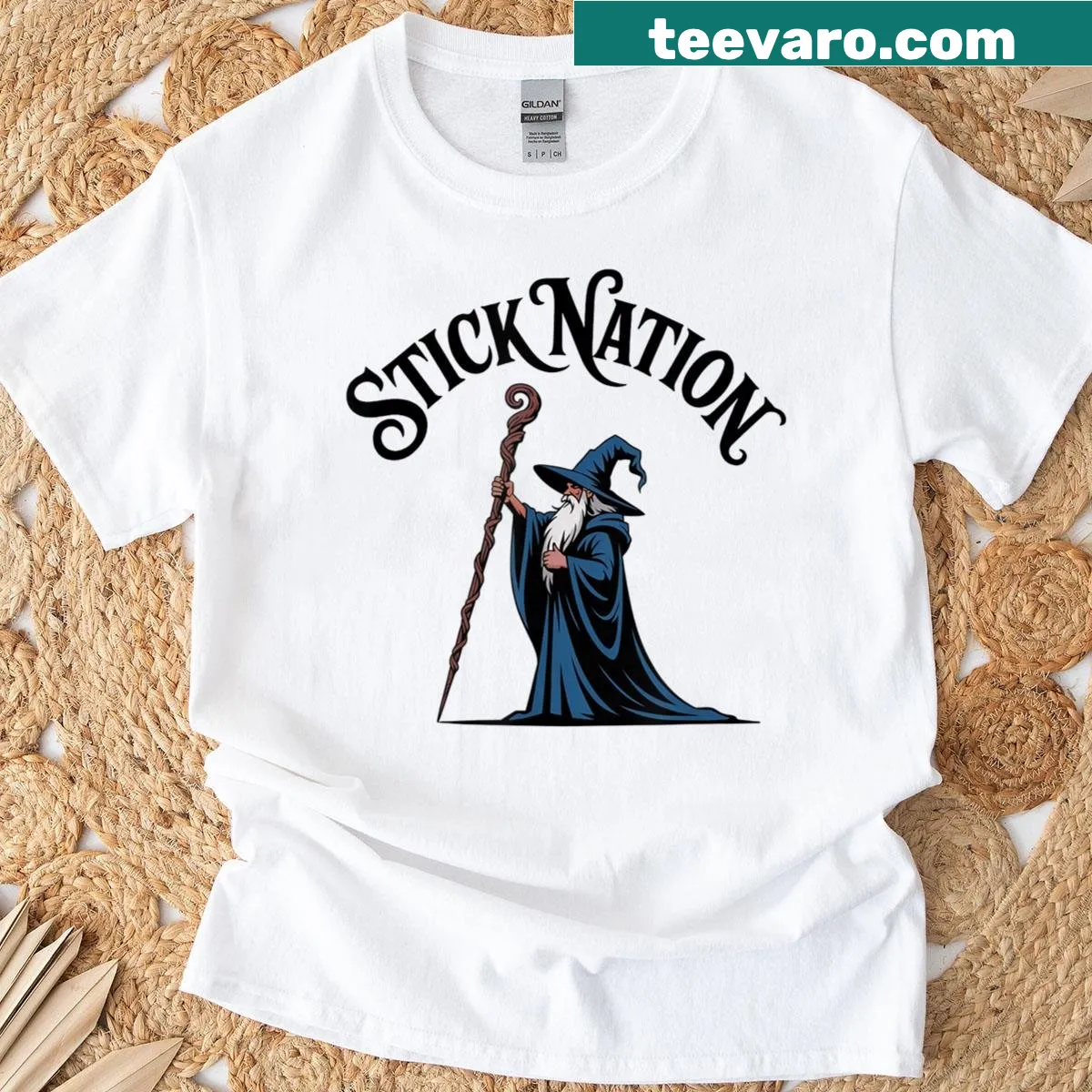 Typographic T-shirt featuring the phrase 'Stick Nation' — on a men's t-shirt