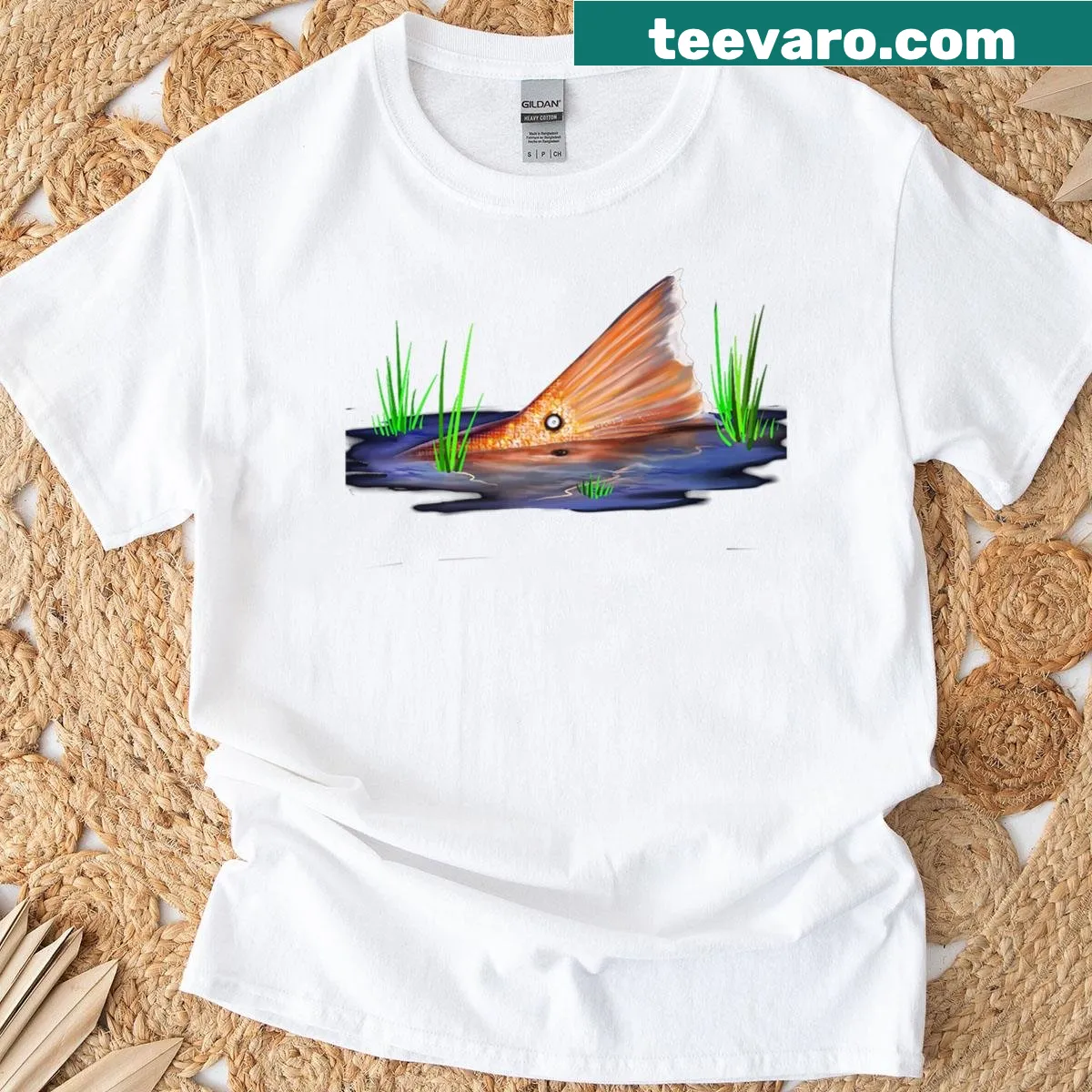 Realistic design of a tailing redfish for fishing enthusiasts — on a men's t-shirt