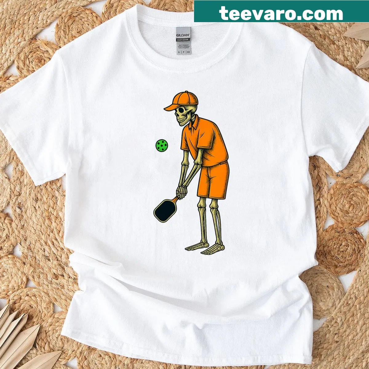 Halloween skeleton playing pickleball graphic T-shirt — on a men's t-shirt