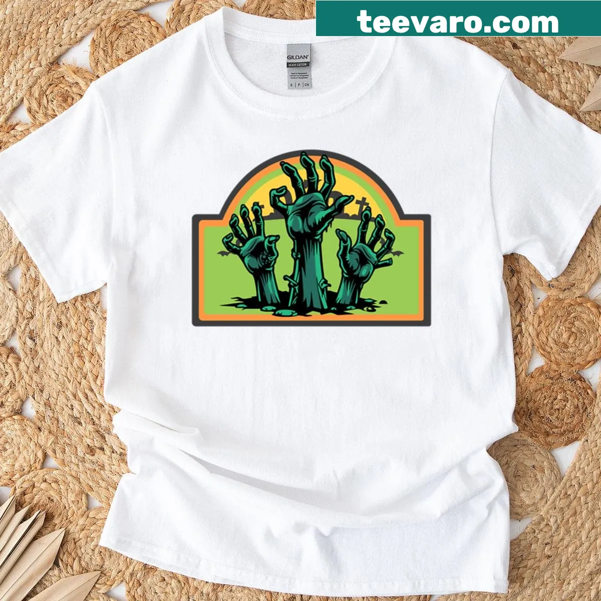 Zombie hand graphic rising from the grave on a t-shirt — on a men's t-shirt