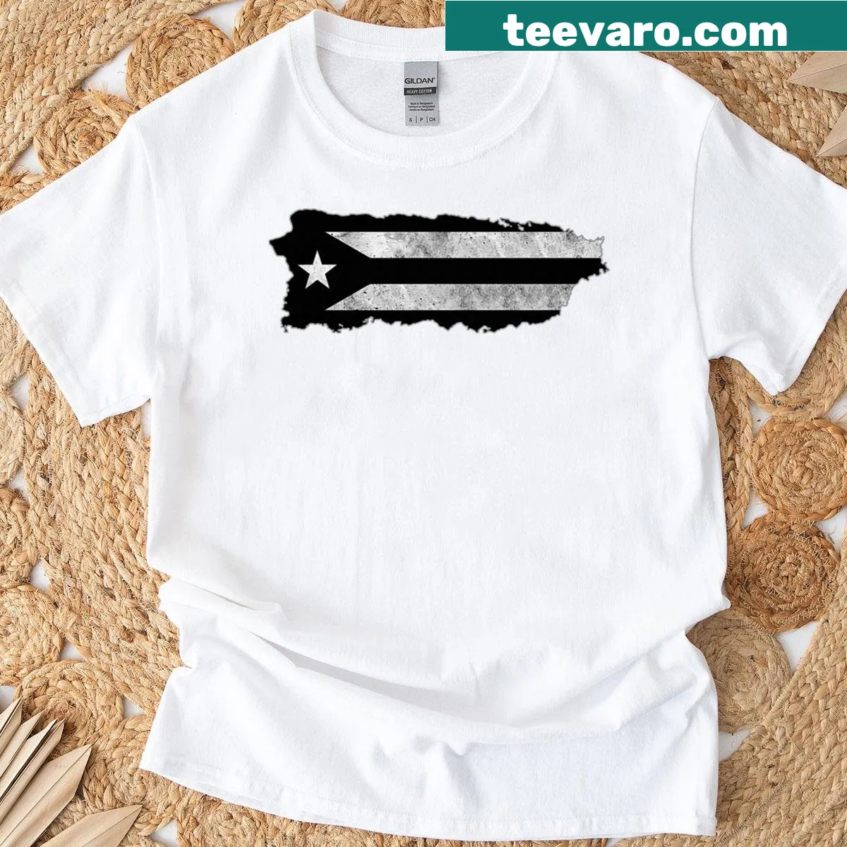 Puerto Rican flag t-shirt with Taino art design — on a men's t-shirt