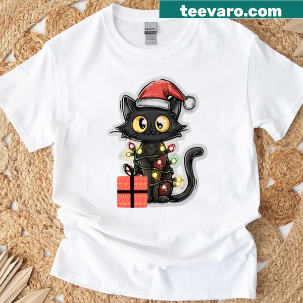 Cute cartoon shirt featuring a black cat tangled in Christmas lights
