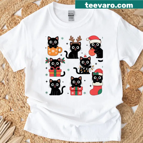 Oversized Christmas t-shirt featuring playful black cats in festive decor