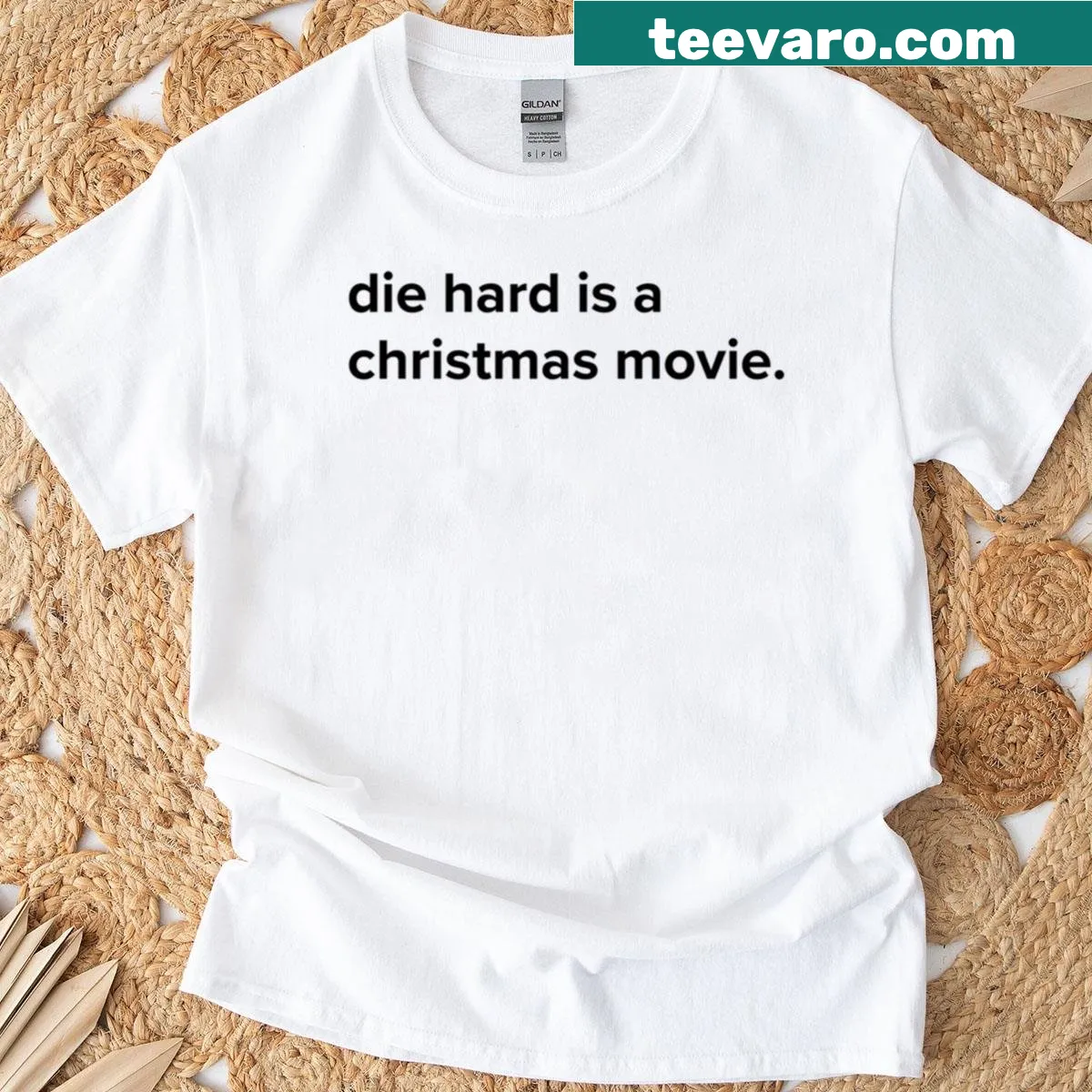 Die Hard Is A Christmas Movie graphic T-shirt — on a men's t-shirt